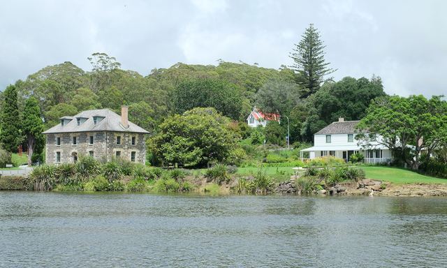 The historic Stone Store and Kemp House beside the Kerikeri River.