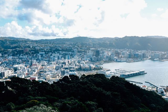 Aerial view of Wellington's waterfront and central city on a sunny day.