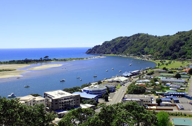 View over Whakatāne township and the Whakatāne River mouth from the lookout above the town.
